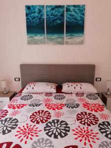 A bed or beds in a room at A CASA