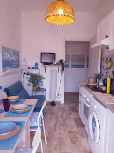 A kitchen or kitchenette at Casa Dionisia