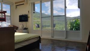 Postel nebo postele na pokoji v ubytování View Mountain B&B