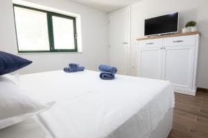 Posteľ alebo postele v izbe v ubytovaní Villa Stipanovi Dvori