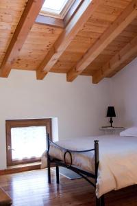 Posteľ alebo postele v izbe v ubytovaní B&B Antico Borgo Marcemigo
