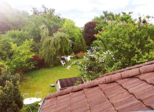 vistas al jardín desde el techo de una casa en Studio Bar sur Mulhouse Sud, en Illfurth