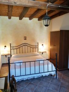Ένα ή περισσότερα κρεβάτια σε δωμάτιο στο Borgo i Stritti