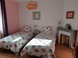 Postel nebo postele na pokoji v ubytování Village de Vie