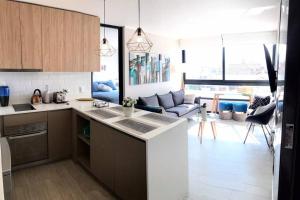 Kuchyň nebo kuchyňský kout v ubytování Ideal departamento en el corazón de Los Dominicos