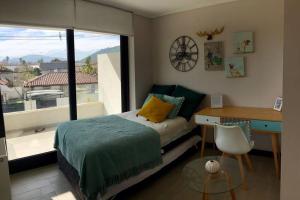 Postel nebo postele na pokoji v ubytování Ideal departamento en el corazón de Los Dominicos + 22 fotografií