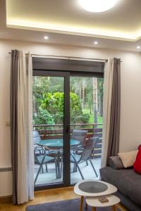 Area soggiorno di Vila Pekovic green-Apartman PAMA