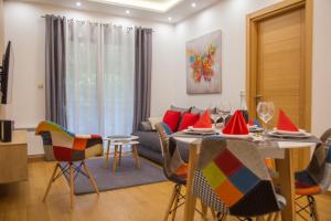 Area soggiorno di Vila Pekovic green-Apartman PAMA