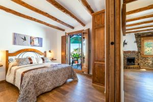 Posteľ alebo postele v izbe v ubytovaní Apartamentos Entre Senderos