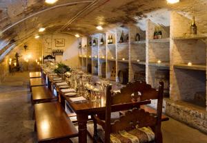 a long dining room with a long table at The Old Ship Hotel in Brighton & Hove