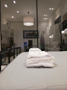 Posteľ alebo postele v izbe v ubytovaní La suite del centro storico