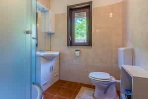 Kúpeľňa v ubytovaní Apartments DESA