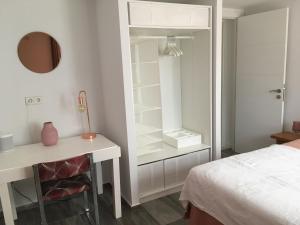 Łóżko lub łóżka w pokoju w obiekcie Can Fuentes