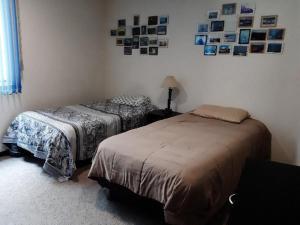 Кровать или кровати в номере Departamento acogedor para viajeros y turistas