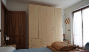 Postel nebo postele na pokoji v ubytování Residenza Olimpo