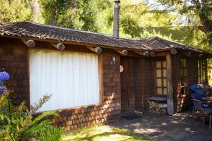 Ein Garten an der Unterkunft Cabañas Monte Verde