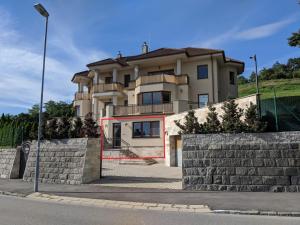 a large house on the side of a street at ClearVueHome - Quiet 51 m2 Studio Bratislava Slavin in Bratislava