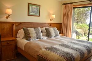 Postel nebo postele na pokoji v ubytování Hotel & Apart Hotel Monte Verde