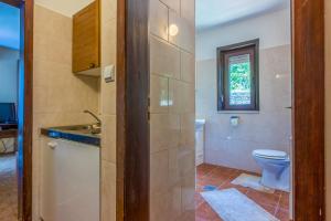 Kúpeľňa v ubytovaní Apartments DESA