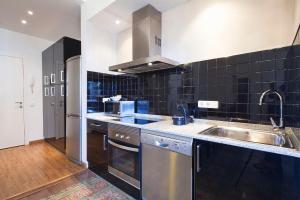 Kuchyňa alebo kuchynka v ubytovaní Central Suites Barcelona