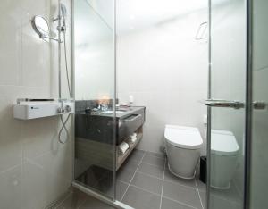 Ein Badezimmer in der Unterkunft Utop Boutique Hotel&Residence