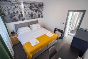 Postel nebo postele na pokoji v ubytování KM therooms BJELOVAR