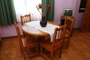 TV a/nebo společenská místnost v ubytování Apartamentos Nelly