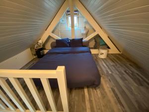 Säng eller sängar i ett rum på Appartement Vue Mer - Cabourg - Normandie