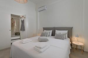 Posteľ alebo postele v izbe v ubytovaní Kite Blue Villas