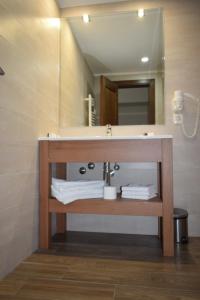 Koupelna v ubytování Hotel Regal