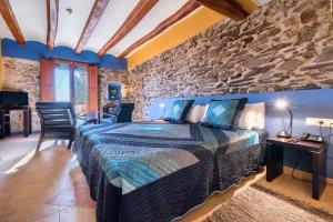 Postel nebo postele na pokoji v ubytování Hotel Cal Llop