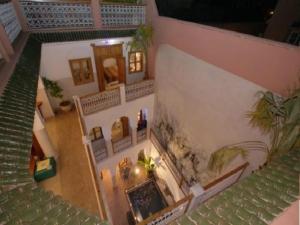 a model of a house with a living room at Riad Chalymar in Marrakesh
