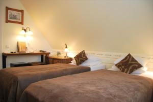 A bed or beds in a room at Hansalinn