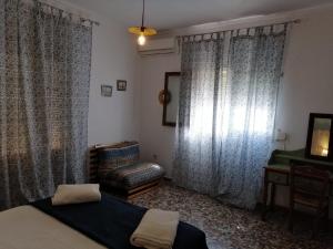 Posteľ alebo postele v izbe v ubytovaní Casa Algarabía