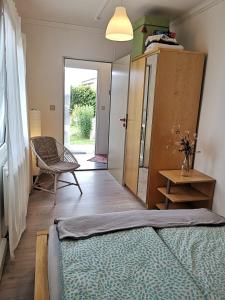 Postel nebo postele na pokoji v ubytování Gästehäuschen „kleine Auszeit“