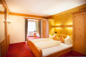 Voodi või voodid majutusasutuse Hotel Alpenblick toas