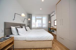 Posteľ alebo postele v izbe v ubytovaní Residence Masna