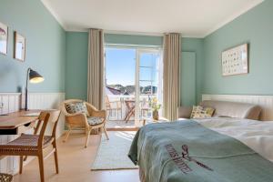 Postel nebo postele na pokoji v ubytování Ruths Hotel