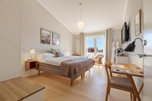 TV a/nebo společenská místnost v ubytování Ruths Hotel