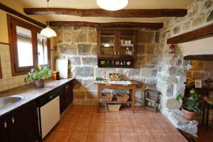 Kuchyňa alebo kuchynka v ubytovaní Casa rural con mucho encanto en un entorno mágico
