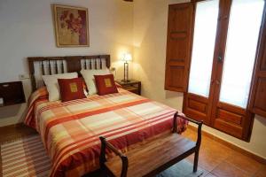 Posteľ alebo postele v izbe v ubytovaní Casa rural con mucho encanto en un entorno mágico