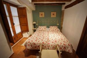 Posteľ alebo postele v izbe v ubytovaní Casa rural con mucho encanto en un entorno mágico