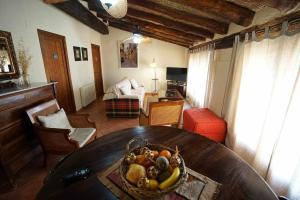 Posedenie v ubytovaní Casa rural con mucho encanto en un entorno mágico