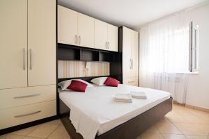 Katil atau katil-katil dalam bilik di Apartments Matić