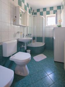 Et badeværelse på Apartments Matić