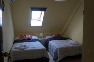 Postel nebo postele na pokoji v ubytování Apartamento Centro Pergo