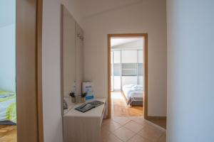 Postel nebo postele na pokoji v ubytování Villas Faro