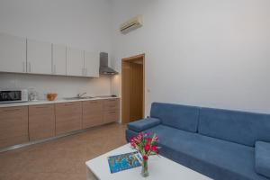 Kuchyň nebo kuchyňský kout v ubytování Villas Faro