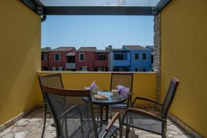 Balkón nebo terasa v ubytování Villas Faro