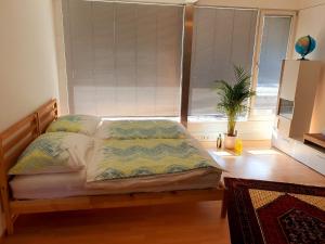 Posteľ alebo postele v izbe v ubytovaní Apartments ChezTom Nenzing